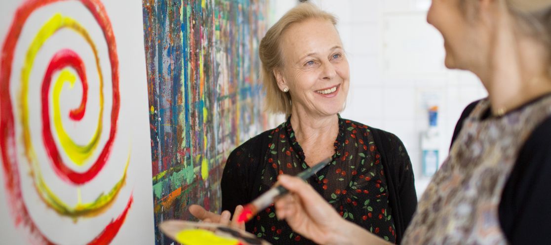 Woman paints a picture