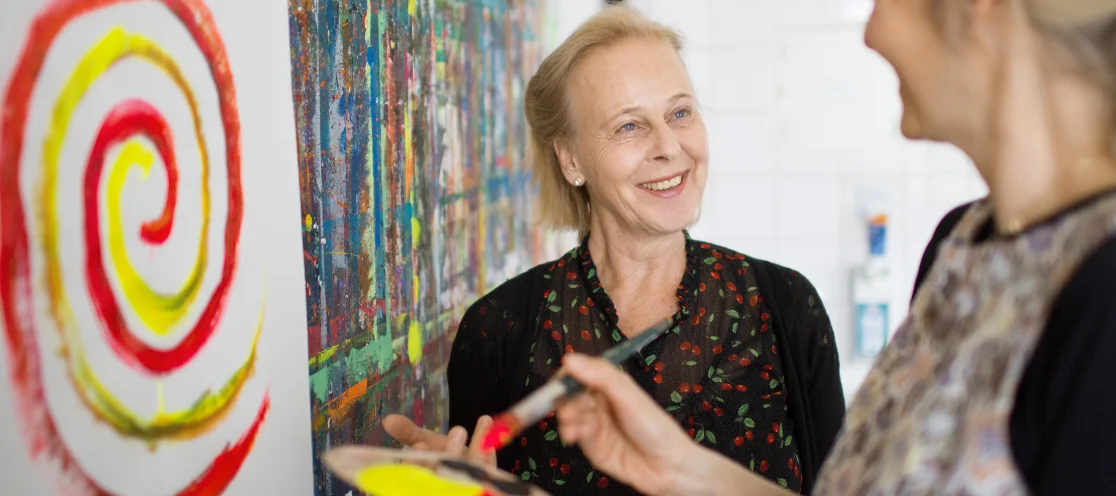 Woman paints a picture
