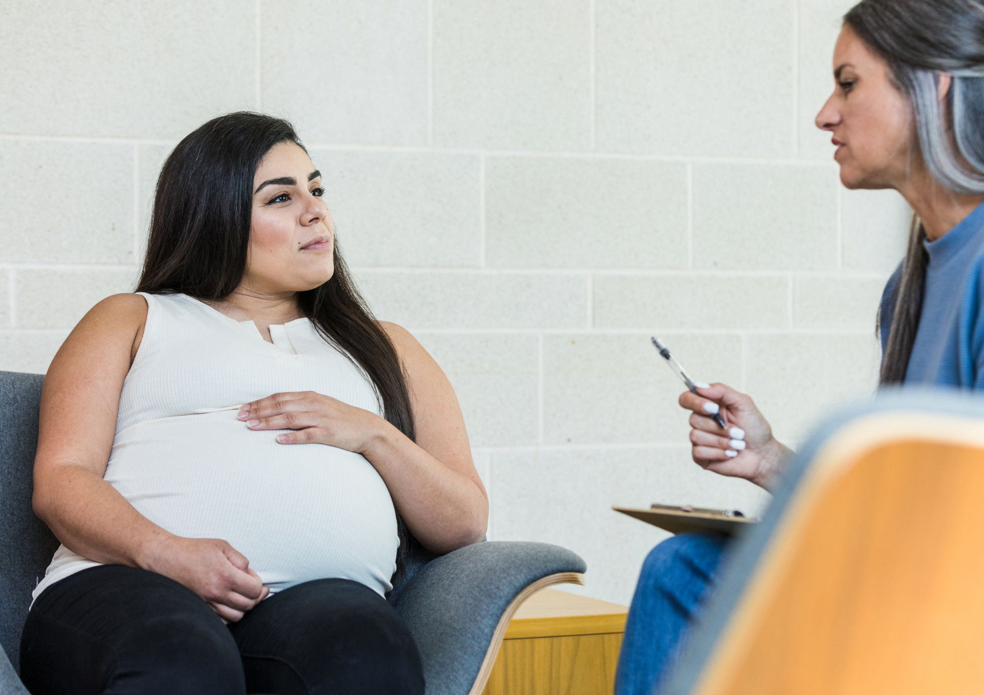 Schwangere Frau in Beratung