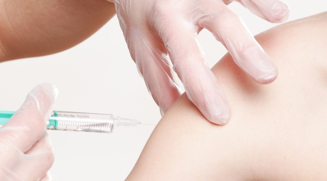 Symbol image syringe and vaccine